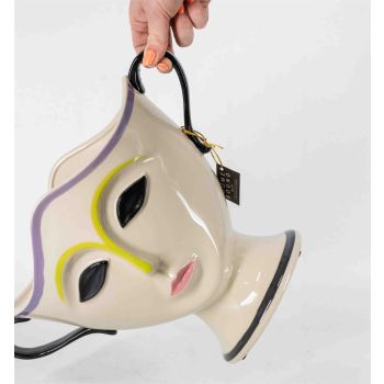 Aardewerk schaal gezicht