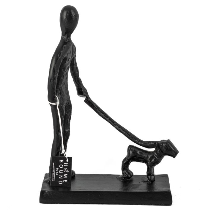 Beeld man met hond zwart