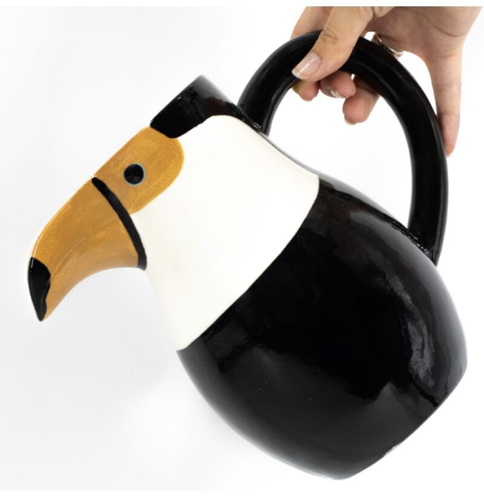 Aardewerk schenkkan vogel