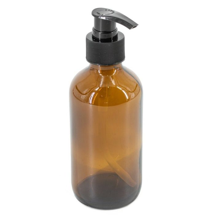 Glazen amber fles met zwarte plastic pomp