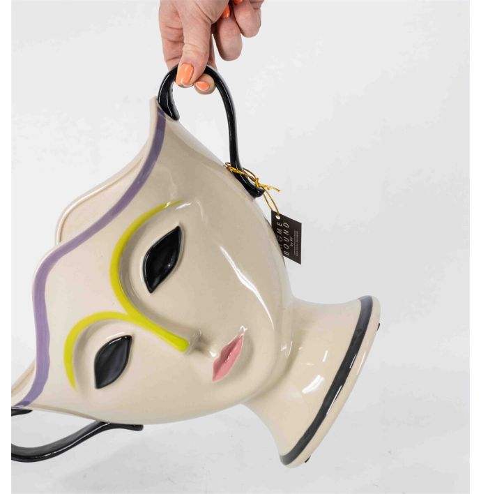 Aardewerk schaal gezicht